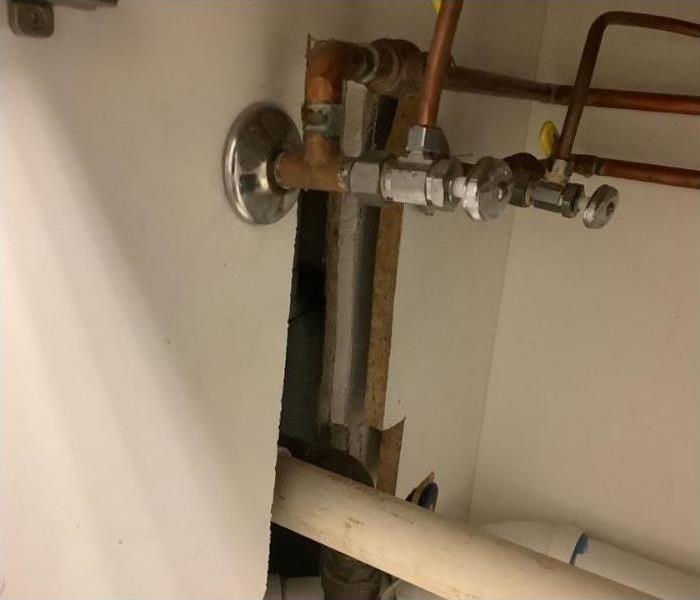 Water pipes under sink post mitigation